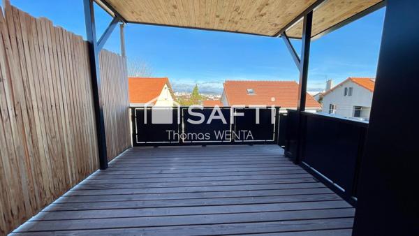 Appartement lumineux et moderne avec terrasse et garage