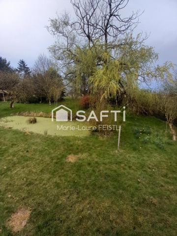 Opportunité rare ! Découvrez cette maison de 137 m², nichée au cœur d’un magnifique jardin de 14 500 m², offrant calme et espace.