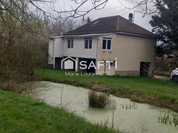 Opportunité rare ! Découvrez cette maison de 137 m², nichée au cœur d’un magnifique jardin de 14 500 m², offrant calme et espace.