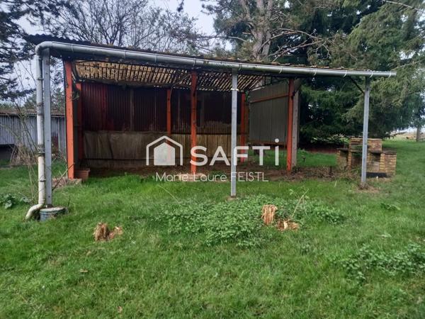 Opportunité rare ! Découvrez cette maison de 137 m², nichée au cœur d’un magnifique jardin de 14 500 m², offrant calme et espace.