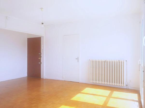 Appartement T3/4 avec garage, cave et vue dégagée
