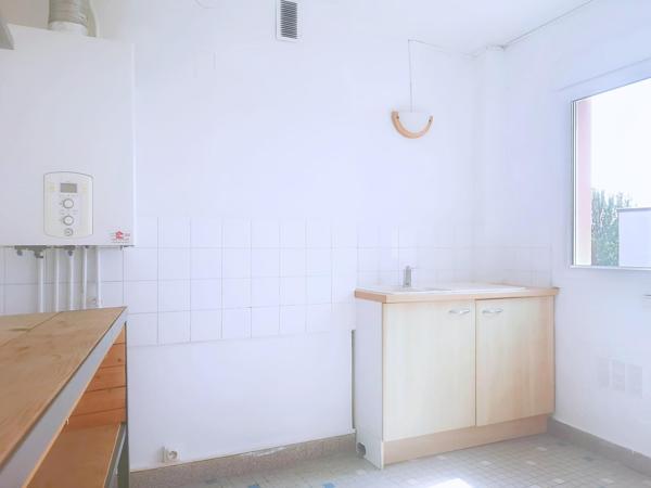 Appartement T3/4 avec garage, cave et vue dégagée