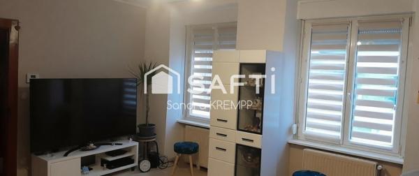 Maison mitoyenne de 4 pièces et terrain constructible