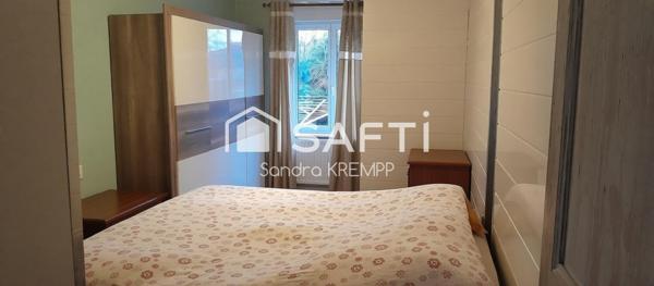 Maison mitoyenne de 4 pièces et terrain constructible