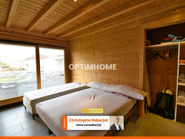 Inédit et rare sur le département: Maison de 220m2 en bois massif sur 2610m2 de terrain clos de murs