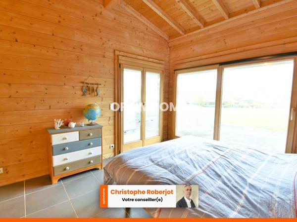 Inédit et rare sur le département: Maison de 220m2 en bois massif sur 2610m2 de terrain clos de murs