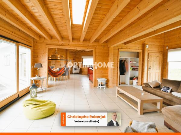 Inédit et rare sur le département: Maison de 220m2 en bois massif sur 2610m2 de terrain clos de murs