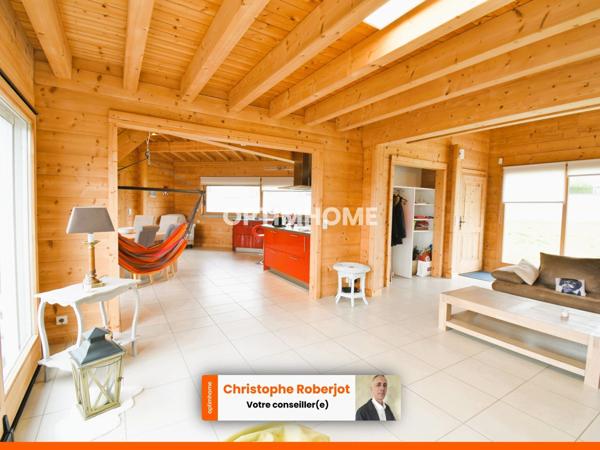 Inédit et rare sur le département: Maison de 220m2 en bois massif sur 2610m2 de terrain clos de murs