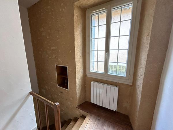 Charmante maison de ville avec local commercial en RDC (vide) dans le centre de Malicorne Sur Sarthe