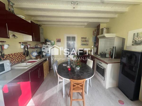 Maison de 114m2 environ 2 chambres, un bureau et un garage