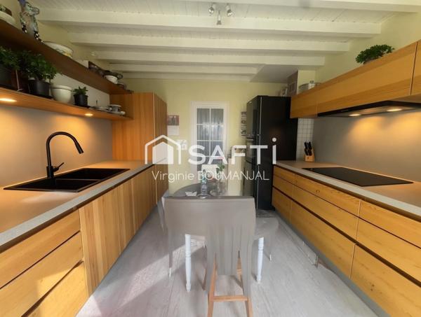 Maison de 114m2 environ 2 chambres, un bureau et un garage