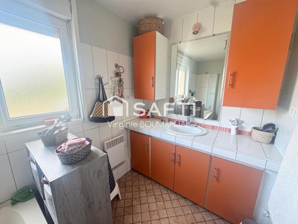 Maison de 114m2 environ 2 chambres, un bureau et un garage