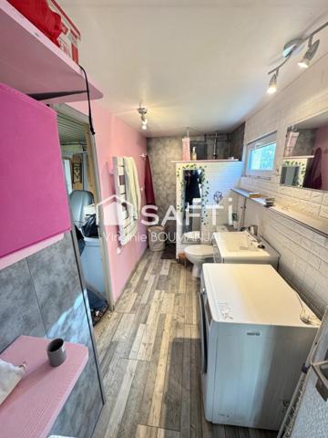 Maison de 114m2 environ 2 chambres, un bureau et un garage