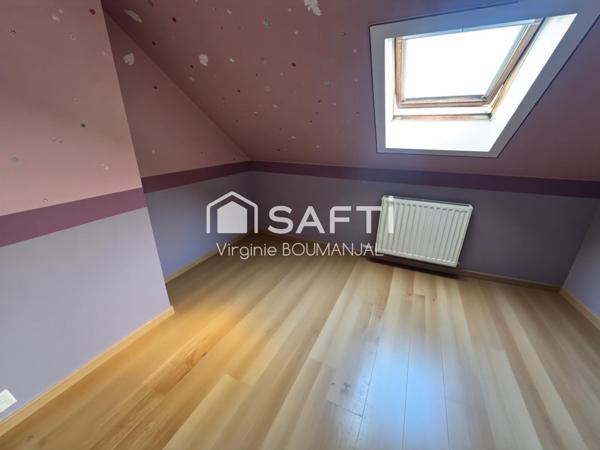 Maison de 114m2 environ 2 chambres, un bureau et un garage