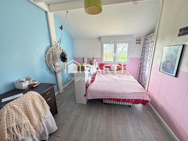 Maison de 114m2 environ 2 chambres, un bureau et un garage