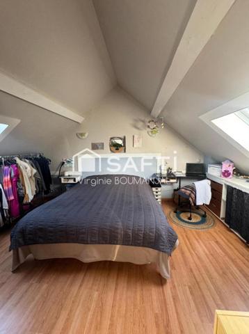 Maison de 114m2 environ 2 chambres, un bureau et un garage