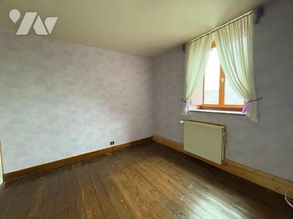 A proximité immédiate du centre-ville, dans un quartier calme, Maison comprenant:
Au rez-de-ch...
