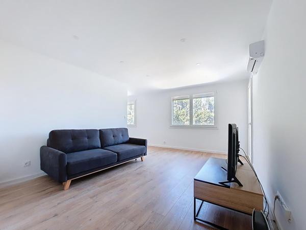 T4 entièrement rénové avec garage et parking