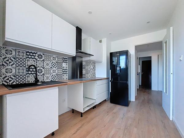 T4 entièrement rénové avec garage et parking