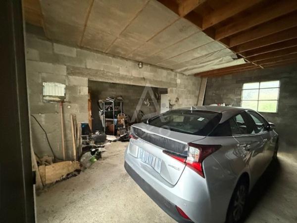 MAGNAC SUR TOUVRE -- GARAGE SUR TERRAIN CONSTRUCTIBLE 980  m2