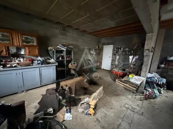 MAGNAC SUR TOUVRE -- GARAGE SUR TERRAIN CONSTRUCTIBLE 980  m2