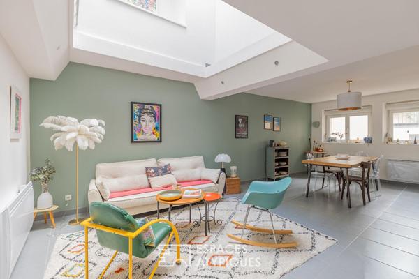 Duplex de caractère avec toit-terrasse à quelques pas de la gare