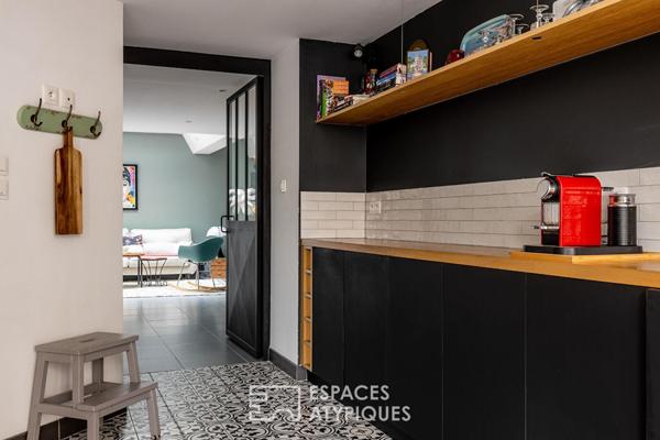 Duplex de caractère avec toit-terrasse à quelques pas de la gare