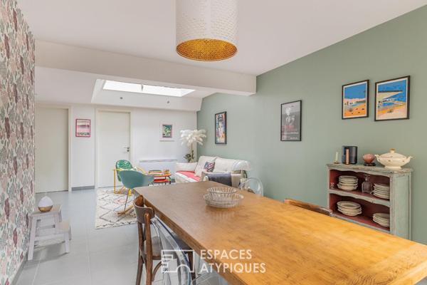 Duplex de caractère avec toit-terrasse à quelques pas de la gare
