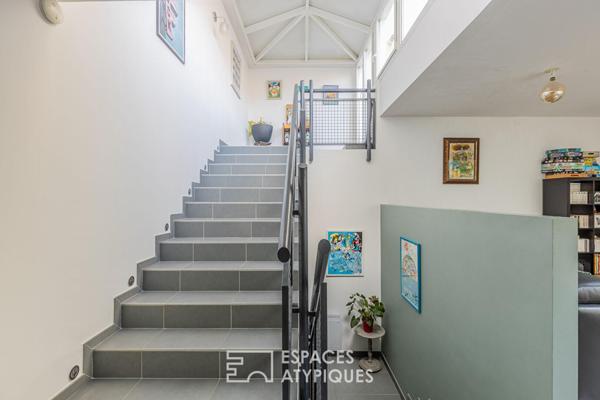 Duplex de caractère avec toit-terrasse à quelques pas de la gare