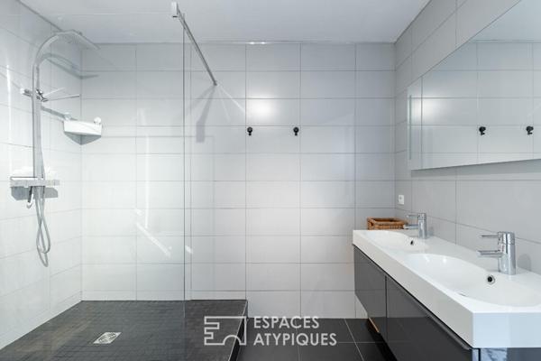 Duplex de caractère avec toit-terrasse à quelques pas de la gare