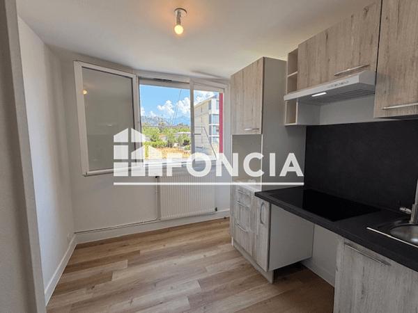 Location Appartement 3 pièces 53.87 m² - 16 RUE DE BASTILLE Fontaine 38600
