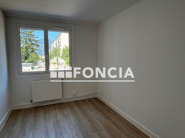 Location Appartement 3 pièces 53.87 m² - 16 RUE DE BASTILLE Fontaine 38600