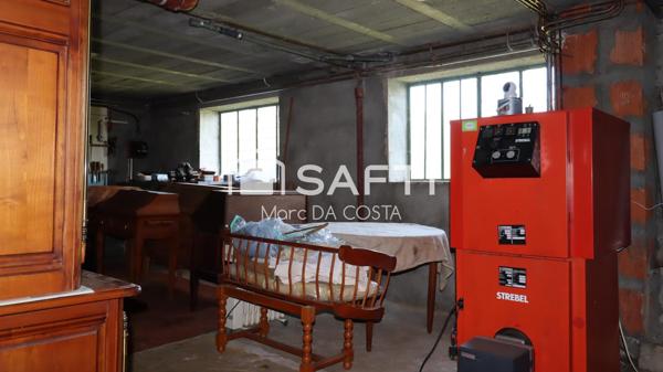 MAISON 180M2.3 CHAMBRES.SOUS SOL COMPLET.TERRAIN 5000 M2