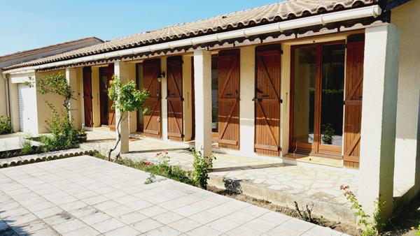 PAVILLON DE PLAIN PIED AVEC JARDIN ET GARAGE