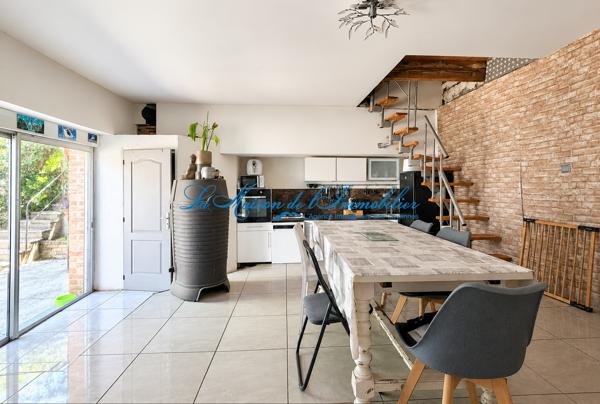Bagard maison en pierre mitoyenne de 134m2 avec garage sur 360m2 de terrain