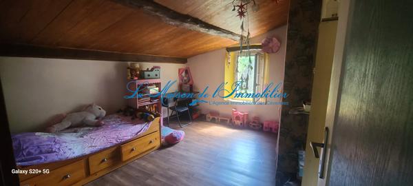 Bagard maison en pierre mitoyenne de 134m2 avec garage sur 360m2 de terrain
