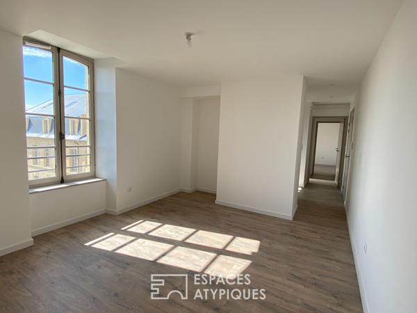 Appartement neuf au dernier étage dans immeuble historique