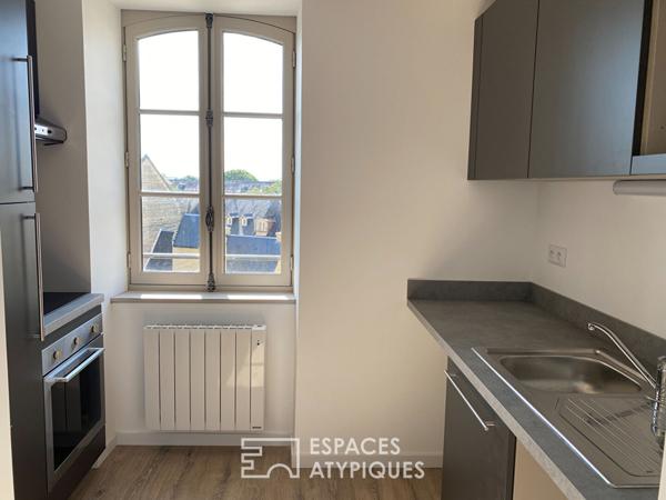 Appartement neuf au dernier étage dans immeuble historique