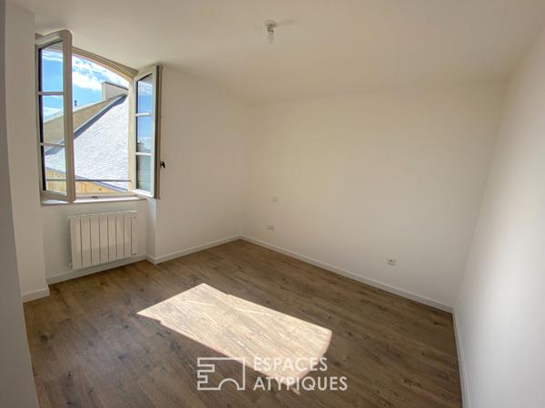 Appartement neuf au dernier étage dans immeuble historique