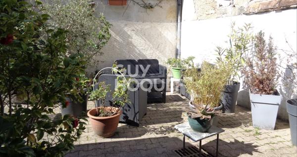 Maison de ville Marmande, 130 m2 avec cour et garage.