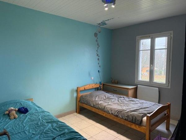 Maison individuelle avec jardin cloturé