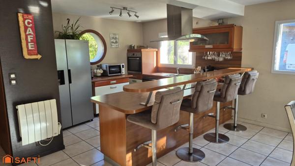 Maison familiale avec atelier indépendant