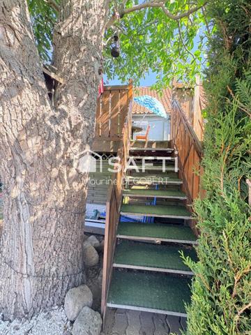 Ensemble immobilier comprenant 1 local commercial et un appartement sur un axe principal