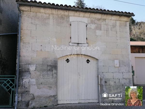 Maison de caractère avec extérieur et garage – Centre de Chalais