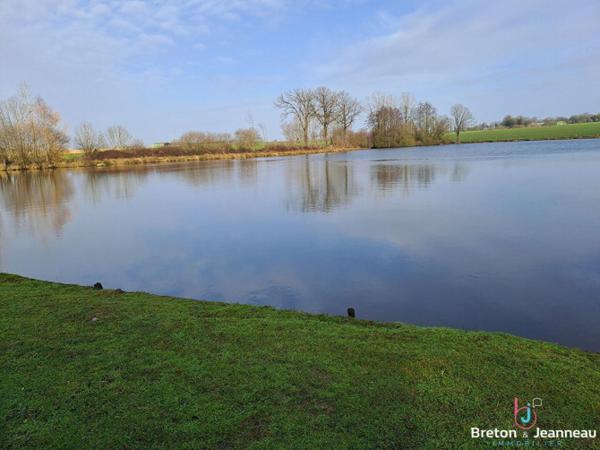 Plan d'eau de 2ha50, prairie et bois le tout sur 6ha environ à Juvigné