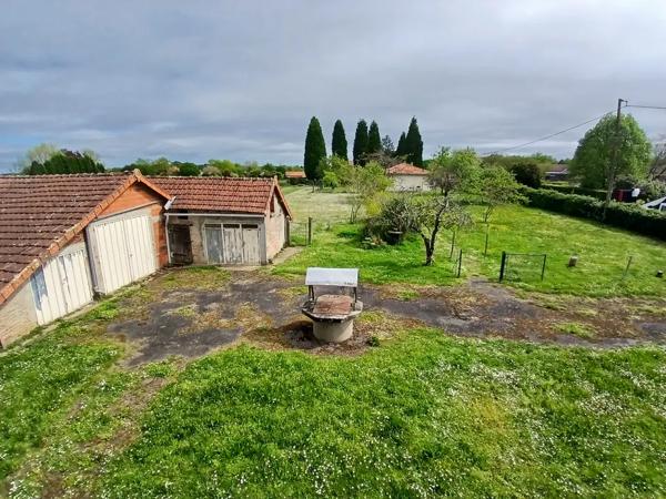 Maison de village avec dépendances, terrain clos et fort pot