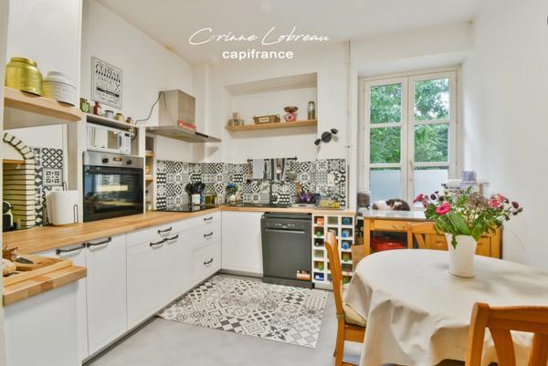 A vendre appartement en rez-de-jardin - 3 chambres