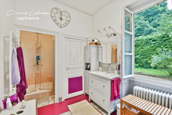 A vendre appartement en rez-de-jardin - 3 chambres