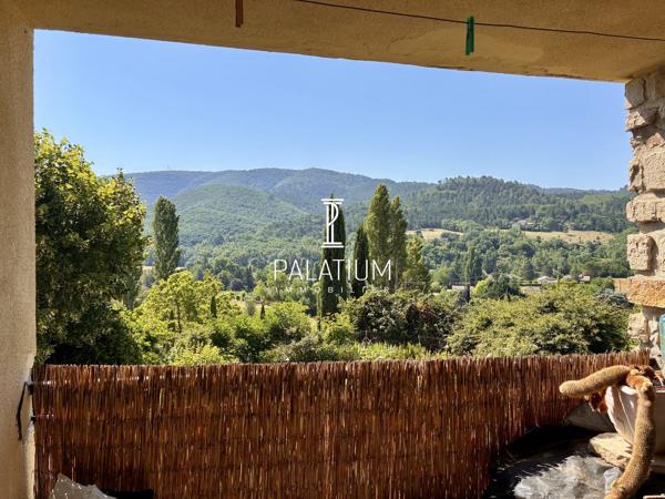 Belle maison de village avec garage et vue panoramique