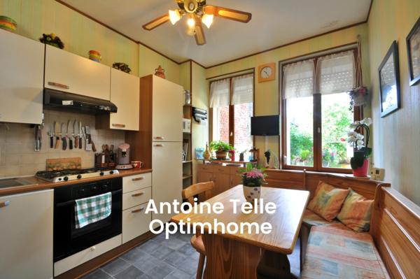 Maison d'habitation & commerce libre avec jardin clos en centre ville - Le Cateau